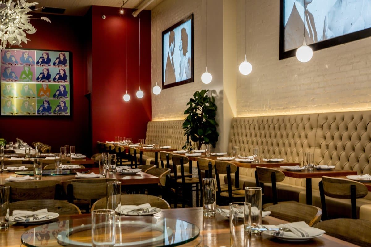 The main dining room at Sofia, set for service