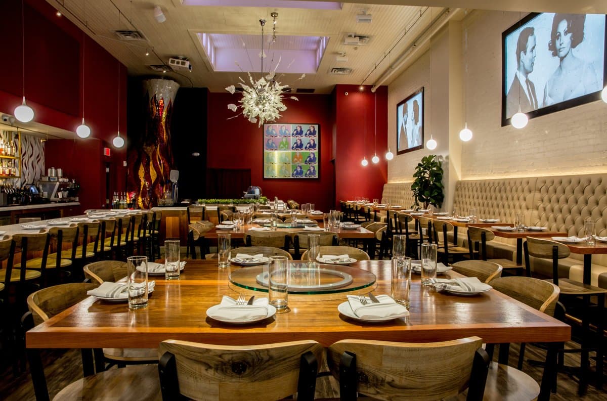 The main dining room at Sofia, set for service