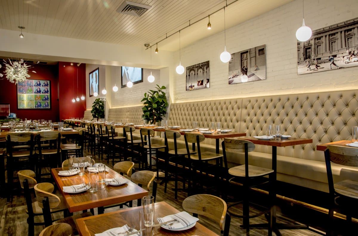 The main dining room at Sofia, set for service