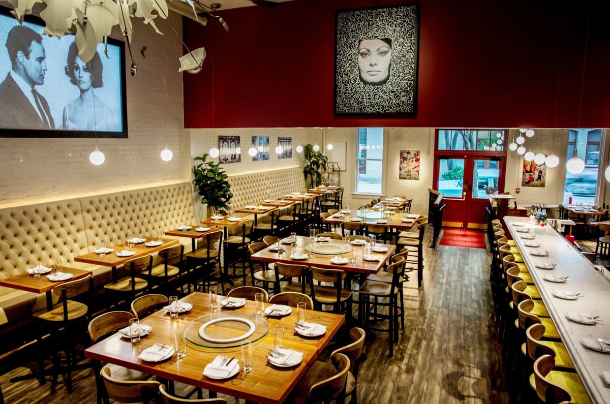The main dining room at Sofia, set for service