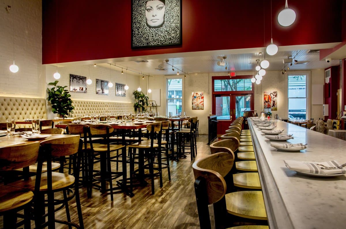 The main dining room at Sofia, set for service